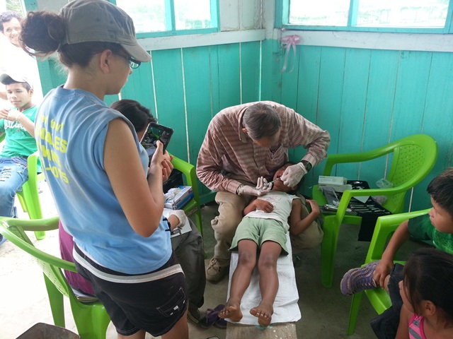 The dentist was not yet and Pr David was willing to help as a Dentist. He did a tooth extraction on this  girl. Most of her teeth was in very bad condition.